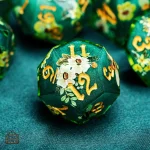 Dés de JDR avec motifs floraux, esthétiques