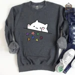 Sweat avec chaton et éléments de jeu
