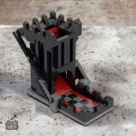 Tour à dés automatique noire en briques de construction
