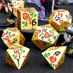 Dé de jeu rose avec finition métallique